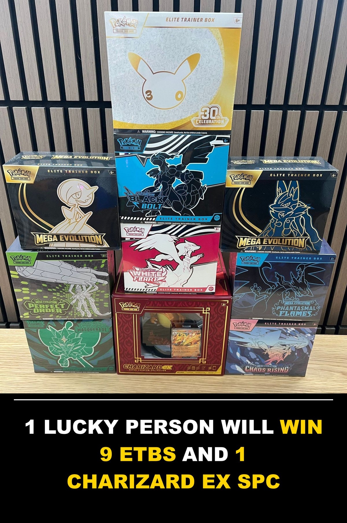 The giveaway prizes: 9 Elite Trainer Boxes and a Charizard ex Super-Premium Collection